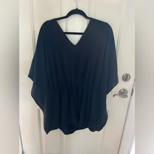Winged black romper. Size medium.